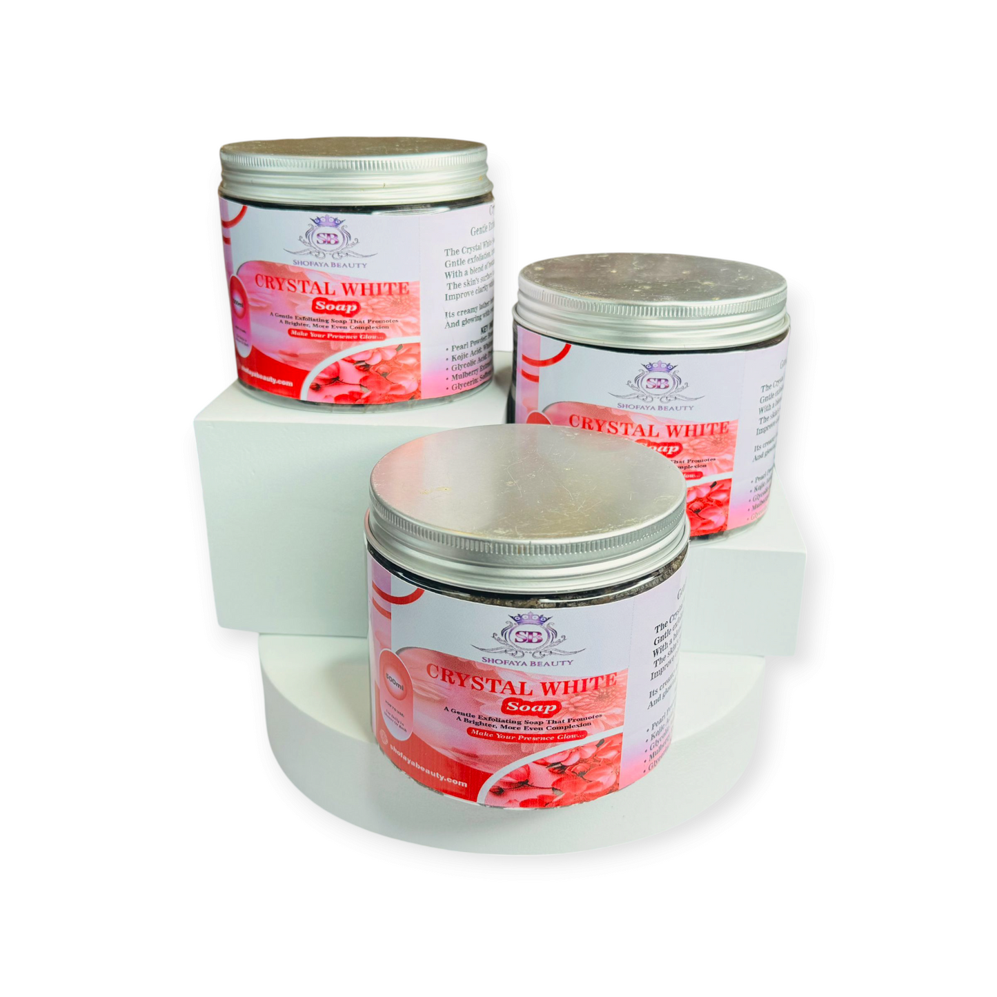 Three jars of Crystal White Soap on a white background