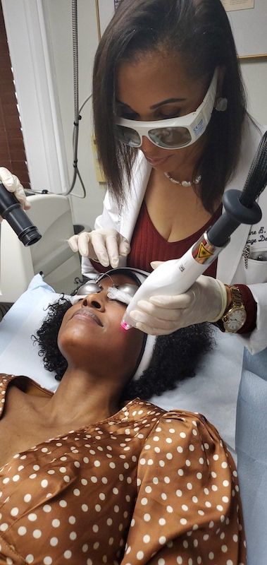 Laser facial treatment procedure in progress