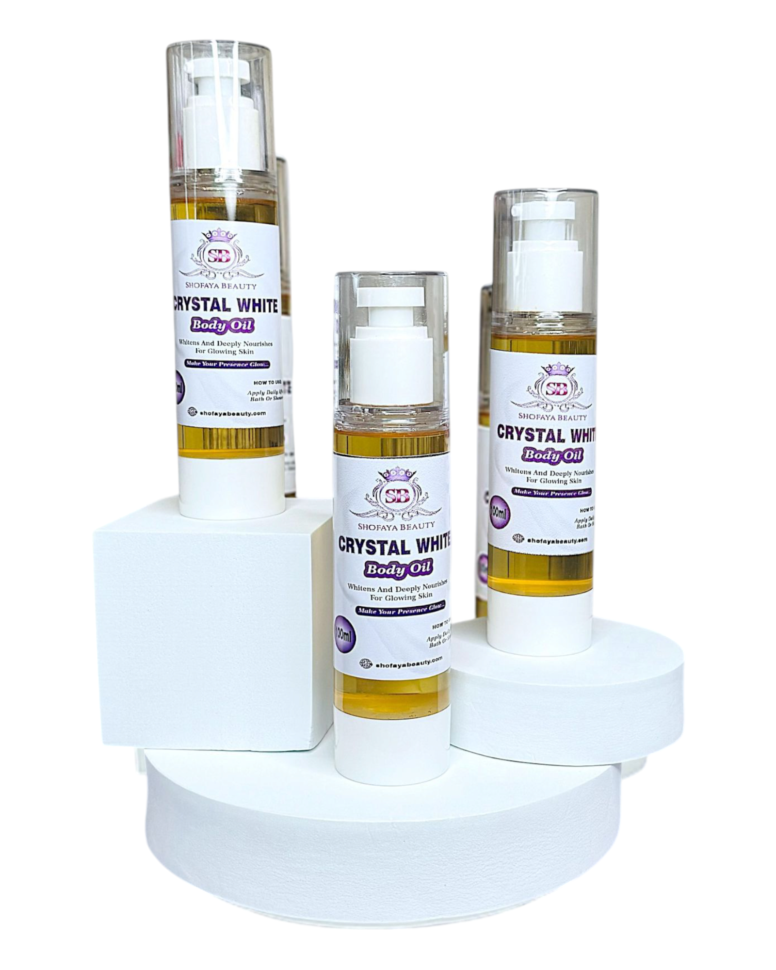 Set of Crystal White body oils on a white stand with a white background