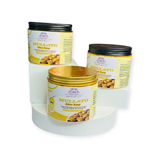 Three bottles of Mulatto Glow Soap on a white background 